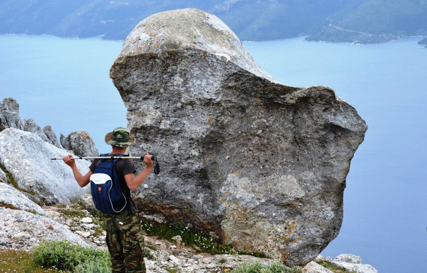 Tourist hiking along mountains